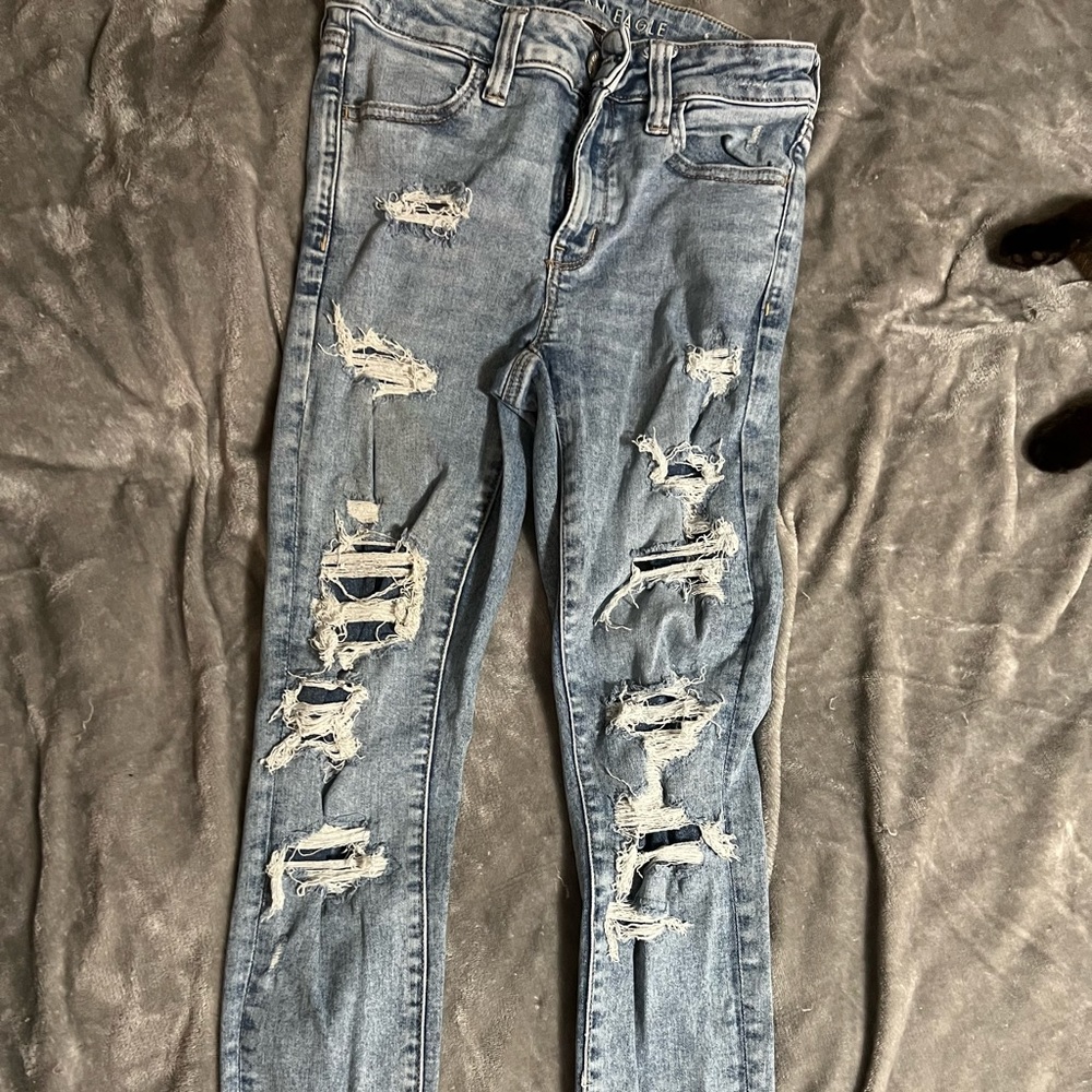American Eagle Next Level Stretch  Distressed jeans with patched holes, 4Short